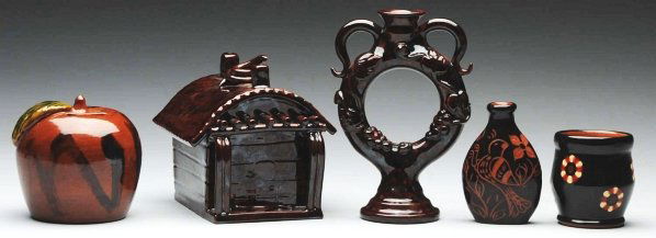 Lot of 5: Lester Breininger Items.: Includes one redware apple bank, one miniature crock, one miniature flask with incised bird, one very unusual miniature candle holder, and one log cabin bank with snake finial. Condition (Excellent).