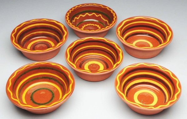 Nice Set of 6 Lester Breininger Redware Bowls.: With yellow and brown slip decorations. Condition (Near Mint Plus). Size Each: 6 - 1/2" Dia.