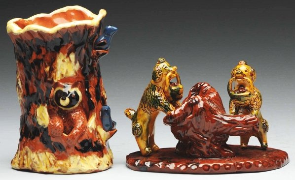 Lot of 2: Lester Breininger Figurals.: Includes one with reclining dog attached to an incised base and one free-form tree stump with a raccoon and numerous birds coming through the sides. Condition (Excellent). Size Largest: 7" T.