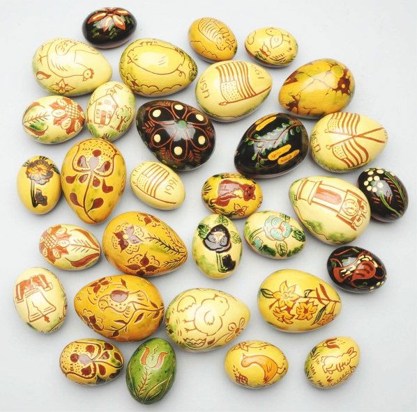 Lot of 32: Lester Breininger Redware Pottery Eggs: Numerous shapes and sizes. All are highly decorated. Condition (Very Good). Size Largest: 3 - 1/2" L.