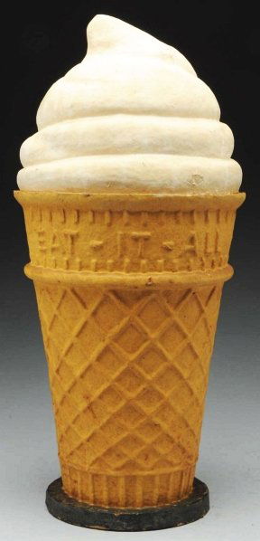 Paper Mache Figural Ice Cream Cone Trade Sign.: Circa 1940s. Nice detail marked "Eat it All" on side. Condition (Excellent). Size 20 - 1/2" T.