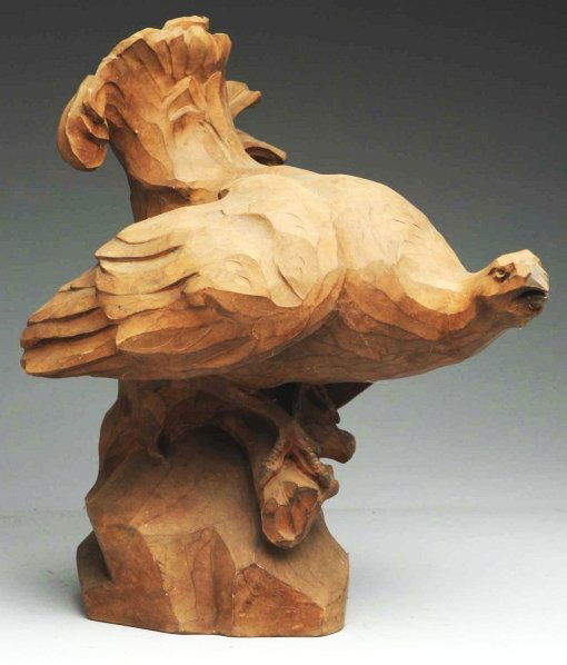 Amphora Model of a Grouse Fowl.: Piece was created to replicate wood. Condition (Excellent). Size 14" T. CORRECTION: The description and estimate have been adjusted to more accurately reflect the lot.
