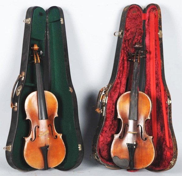 Lot of 2: Violins in Case.: Includes a Georgina Seifert violin, circa 1800s, and a Paul R. Murray, 1915 violin. Both need to be re-strung. Bows are not included. Condition (Very Good). Size Largest Case: 30 - 3/4" L. CORRECTION: