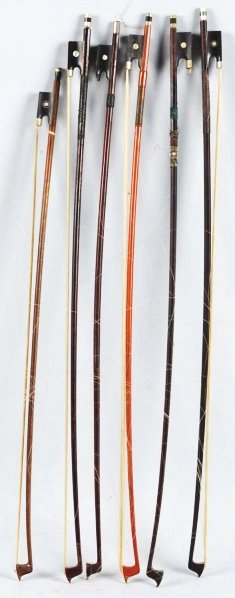 Lot of 6: Violin Bows.: Includes two name brand bows including Bausch and Sachsen. Condition (Very Good). Size Each approx.: 29 - 1/2" L. ADDITIONAL INFO: The description has been updated to more accurately reflect the lot.