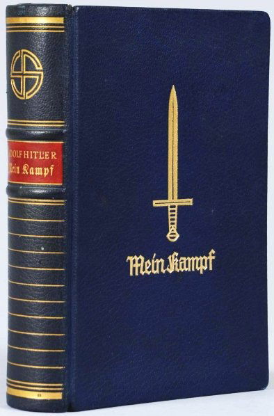 Original Signed Adolph Hitler "Mein Kampf" Book.: 1939 edition of the original 1920s book that Hitler wrote while he was in Landsberg Prison in Germany. This copy has a very rare signature of Adolph Hitler on front inside cover page and is dated "194