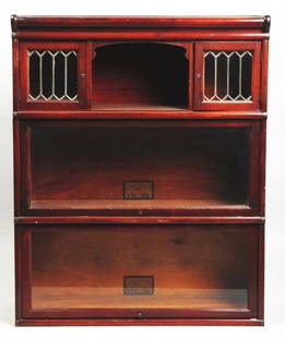 Wooden 3-Piece Bookshelf.: 19th Century. Made by Globe Wernicke Company. Top portion retains the original leaded glass doors. Condition (Very Good Plus). Size 42" x 34".