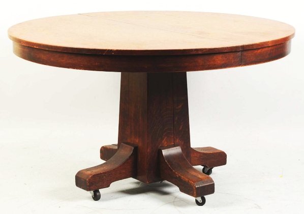 Round Oak Table Signed Stickley.: Circa 1890. With six leaves. Condition (Excellent). Size 54" Dia. (without leaves).