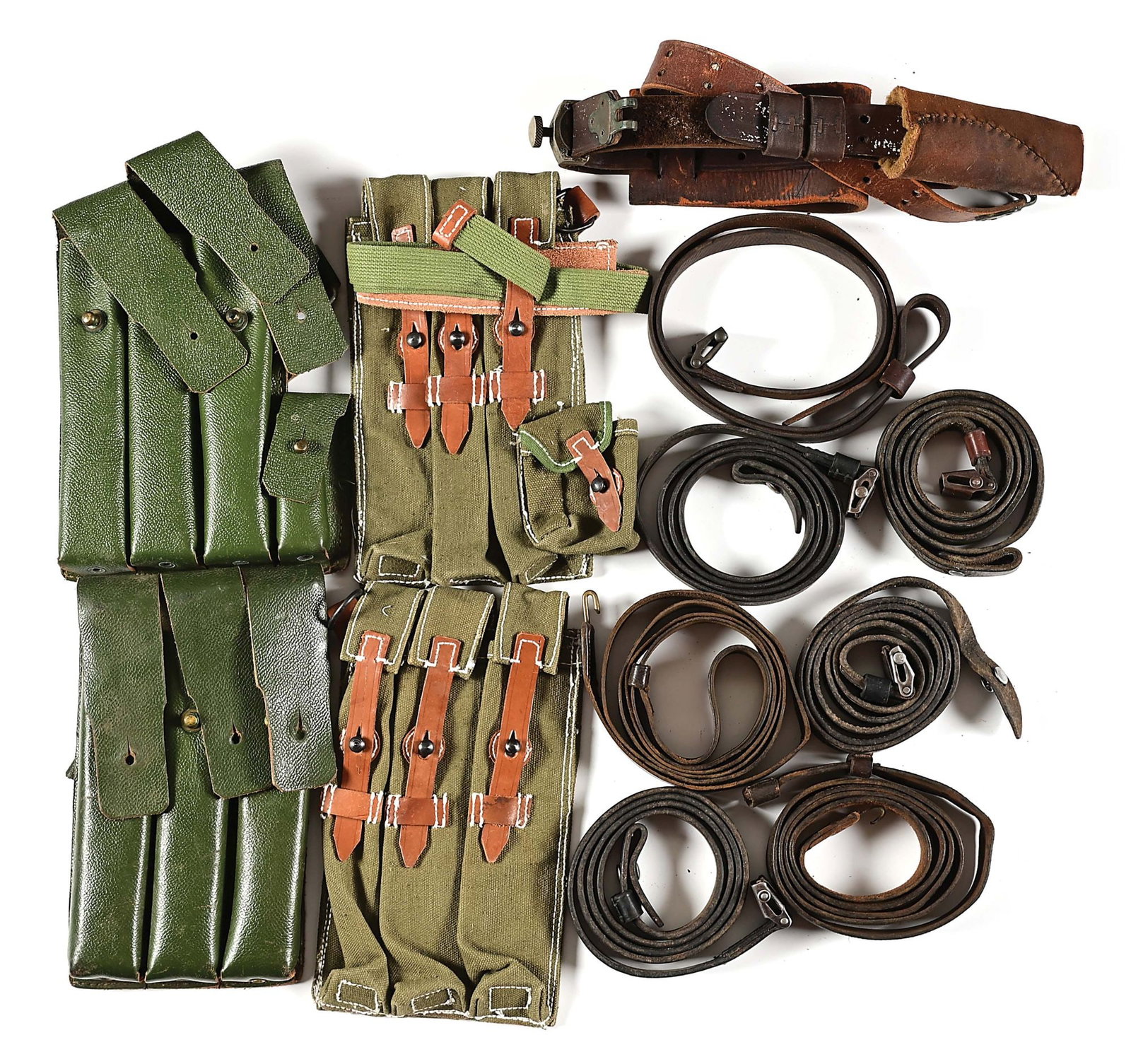 LOT OF 5 ORIGINAL MP-40 SLINGS WITH 2 SINGLE HOOK SLINGS, U.S. LEATHER SLING AND 2 NOREWEGIAN AND: Lot consists of (A) Five very nice original German MP-40 slings; all but one includes metal stud. No discernible ink markings. (B) Two single brass hook leather slings (C) One U.S. rifle heavy duty ca