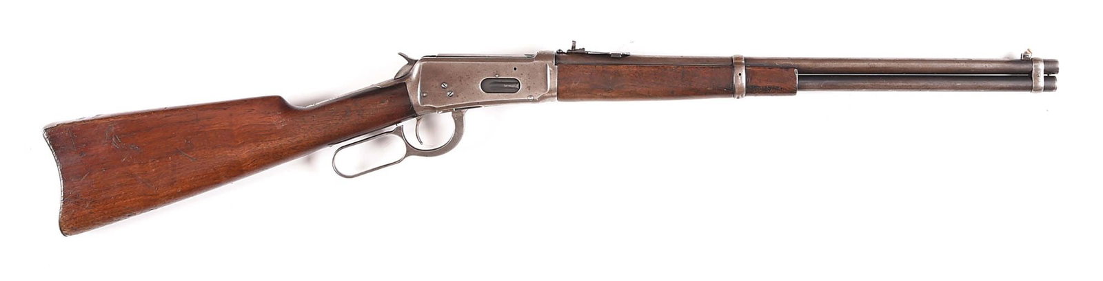 (C) WINCHESTER MODEL 1894 SADDLE RING CARBINE.38-55 WCF.: Manufactured in 1911. Standard carbine in great caliber features full tube magazine, replaced front brass sight blade, D.W.KING rear sight, blue finish, saddle ring and stud, walnut stock with steel c
