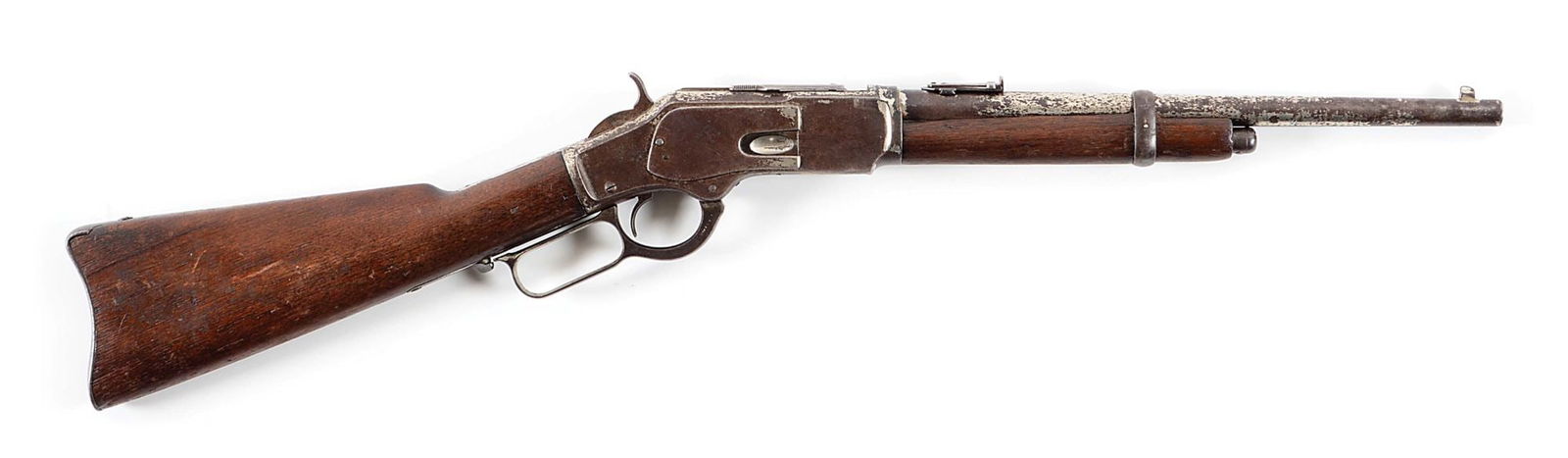 (A) VERY RARE WINCHESTER MODEL 1873 15" TRAPPER CARBINE WITH BUTTON MAGAZINE.: The factory research lists the date shipped as September 23, 1882 with a 15" barrel and half magazine. There is no note as to finish or caliber. This trapper was finished in nickel plate and the calib