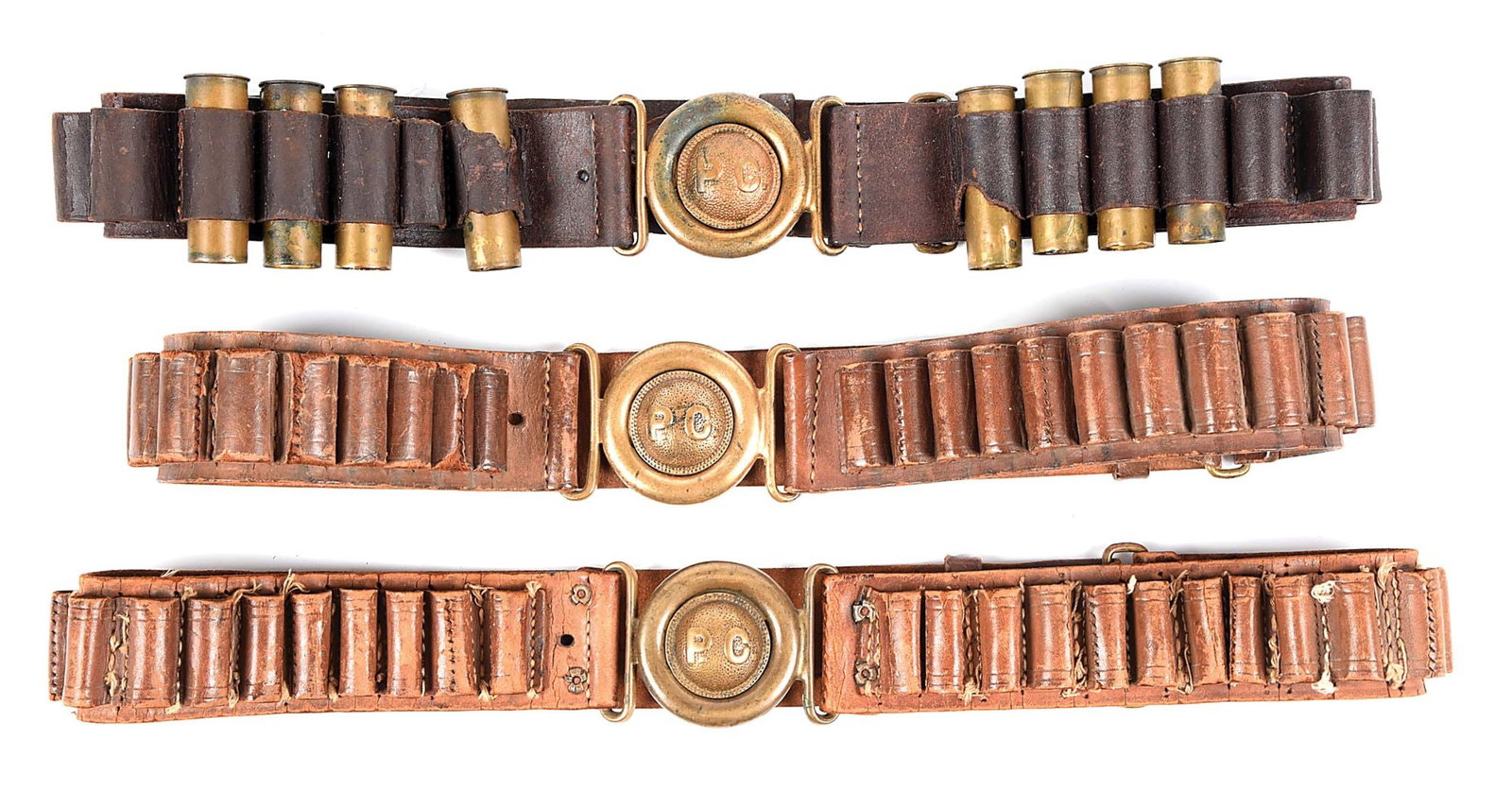LOT OF 3: PHILIPPINE CONSTABULARY TYPE 1 BELTS.: Lot consists of 3 Philippine Constabulary Type 1 belts. Among the first known Philippine Constabulary orders through Hartley & Graham in New York was 5,000 Remington 12 Ga, single-shot shotguns and in