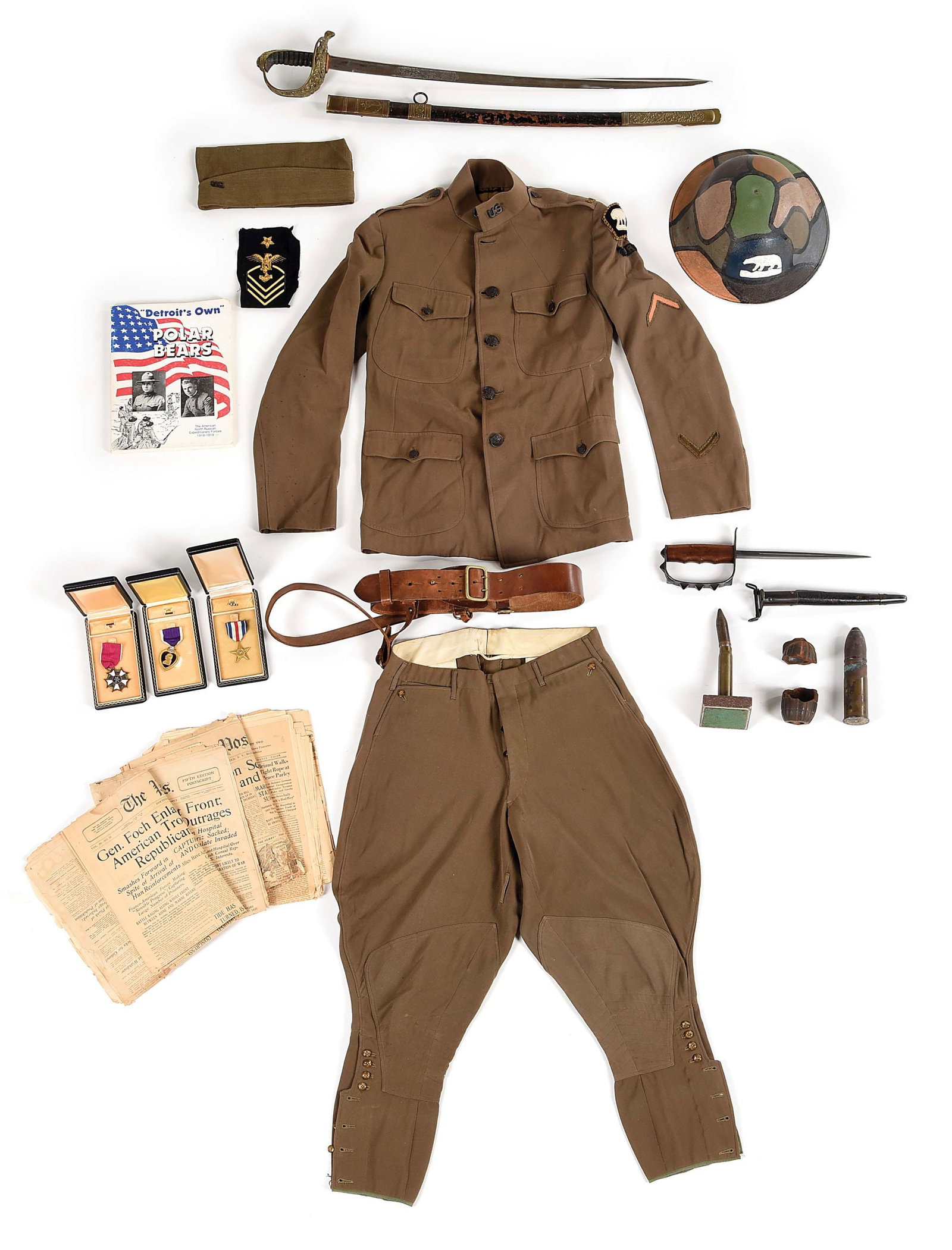 US WWI 339TH INFANTRY REGIMENT UNIFORM, HELMET, MEDAL, AND EPHEMERA GROUPING.: An interesting World War I AEF uniform grouping to an officer who was part of the 339th Infantry Regiment. The grouping includes a summer weight uniform that consists of a jacket and trousers. The jac