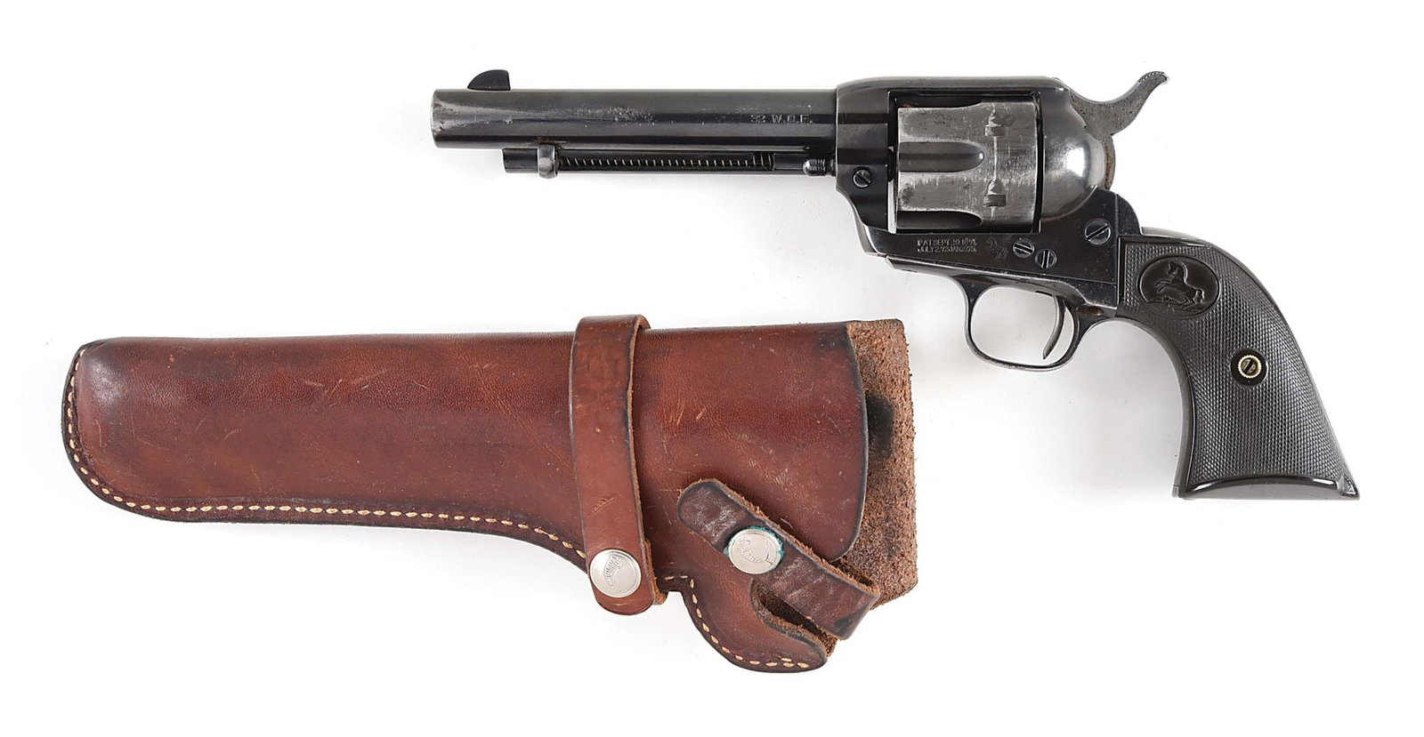 (C) INTERWAR COLT SINGLE ACTION ARMY REVOLVER.: Manufactured circa 1912. Thinning period reapplied blue finish and factory hard rubber grips with iconic Rampant Colt vignette. Standard markings and sights. Complete with Hunter leather holster. COND