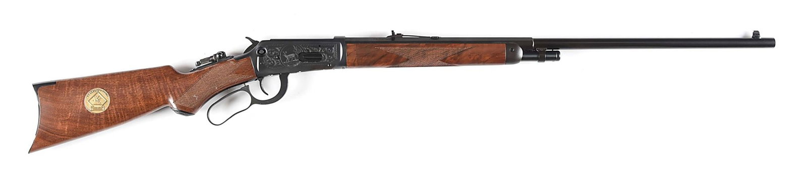 (M) WACA COLLECTOR ISSUE WINCHESTER MODEL 1894-1994 LEVER ACTION RIFLE.: 1 of 250 made in 1994, Features include 24" half octagon blued steel barrel with dovetailed blade bead front sight, adjustable buckhorn rear, and tang mounted peep sight. Blued solid frame with No. 9 