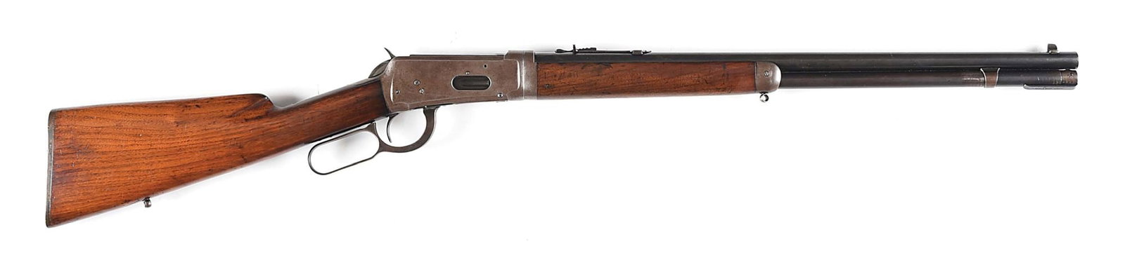 (C) SPECIAL ORDER WINCHESTER MODEL 1894 LEVER ACTION SHORT RIFLE (1915).: Manufactured 1915. Special order 22" round take down short rifle with special shorter 8 - 1/4" forearm with fluted walnut shotgun buttstock and Winchester gutta percha butt plate with sling eyes, flat