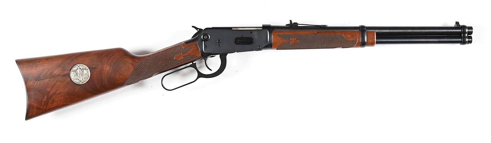 (M) DELUXE WINCHESTER MODEL 94AE RANGER CARBINE IN .45 COLT.: Fitted with a desirable trapper length blued 16" barrel in .45 Colt with a full length magazine retained by a pair of carbine barrel bands. Sporting sights. Angle eject receiver with cross bolt safety