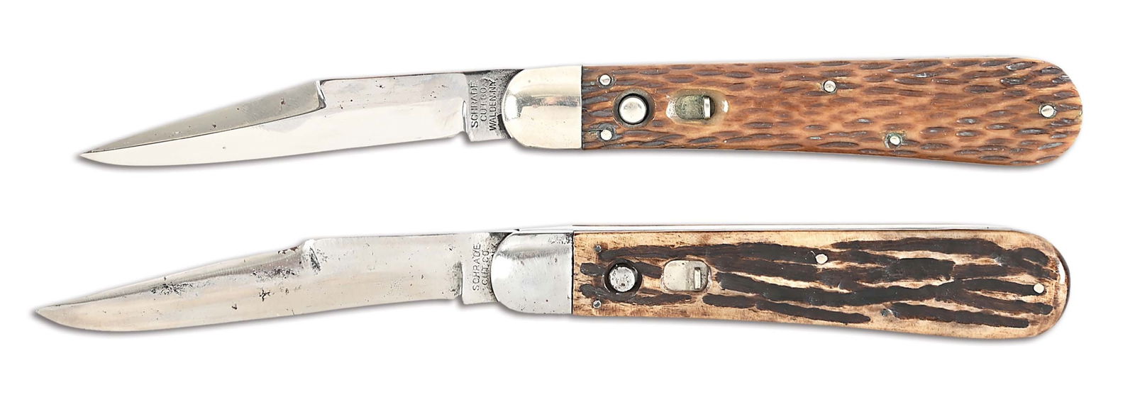 LOT OF 2: SCHRADE CUTLERY CO. AUTOMATIC KNIVES.: Lot consists of (A) Marked "SCHRADE / CUT CO. / WALDEN, N.Y." on ricasso. Clip point blade with pitting and evidence of polishing. Steel bolsters and liners. Stag grip scales. Functioning spring and l