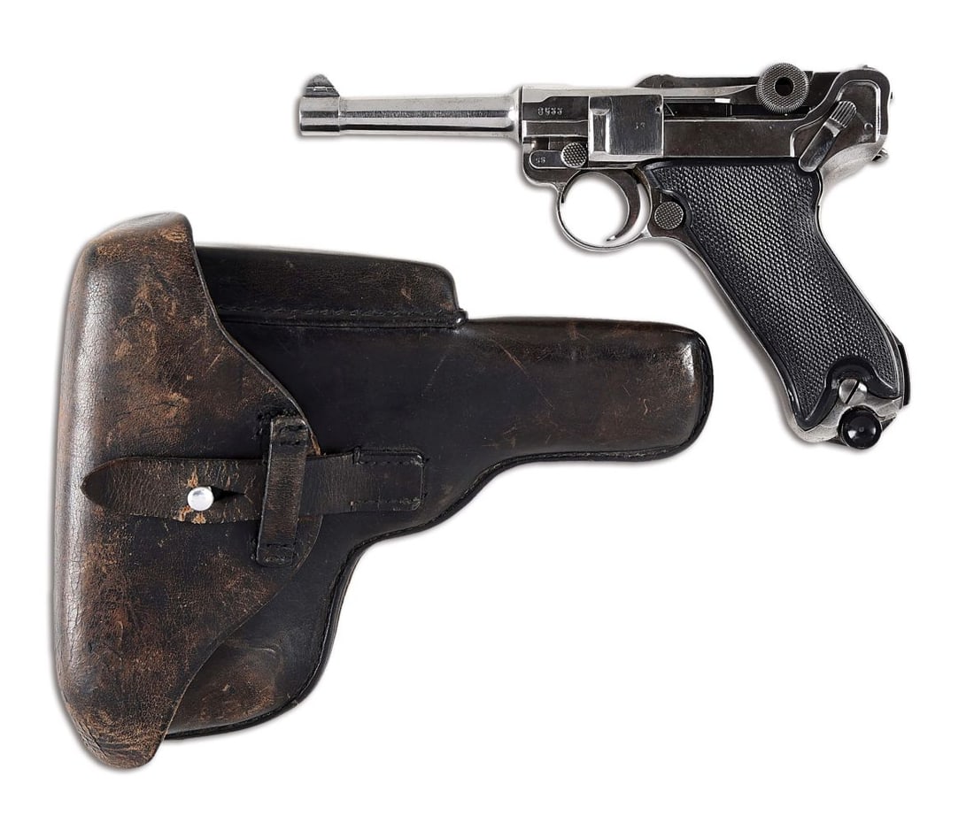 (C) MAUSER P08 LUGER SEMI AUTOMATIC PISTOL.: S/42 on the front toggle link and a 1938 date over the chamber. Correct "(eagle) / 63" waffenamt on the right side of the receiver. Modern black plastic two piece checkered grips. Nickel plated magazi