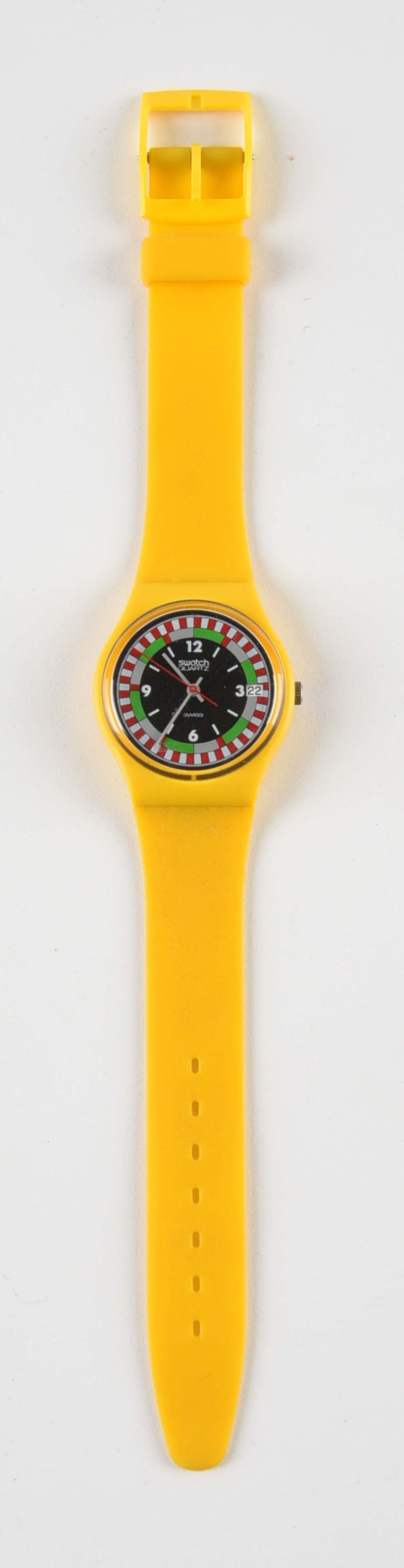 STANDARD GENTS SWATCH: GJ400 "Yellow Racer" Standard Gents Swatch Watch. Includes "Swatch Quartz" Marking on Watch Face. Issued in 1984. Condition: Excellent Dimensions: 1 - 1/2" x 1/2" x 9 - 1/4".