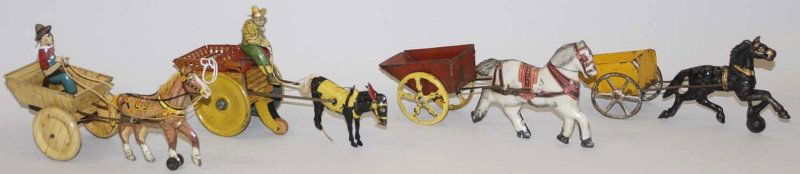 Lot of 4: Wind-Up & Push Toys.: Includes a Strauss Balky Mule, a Marx Balky Mule, and two early cast iron tin and pressed steel, horse-drawn push cart toys. Modern scratching and wear throughout. Some paint loss to cast iron horse.