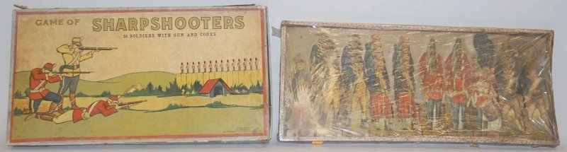 Lot of 2: Early Paper Soldier Games.: Both are probably Milton Bradley. One is in original box marked "Milton Bradley." Comes with a gun with oxidized and rusted barrel and grouping of soldiers on wooden bases. Gun shoots corks; corks not