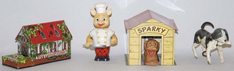 Lot of 4: Japanese & American Misc. Toys.: Includes a wind-up dog, a wind-up piggy cook, a wind-up mystery bank and an American made battery-operated Sparky dog house. Condition (Very Good). Size Largest: 4 - 1/2" T. Largest: 4 - 1/2" T.