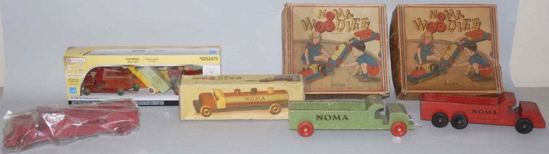 Lot of Vintage Wooden Vehicle Toys.: Includes several Noma Woodies sets in original boxes along with two trains and one boxed truck. Also includes some unboxed larger trucks and one unboxed set of smaller delivery trucks. Various conditi