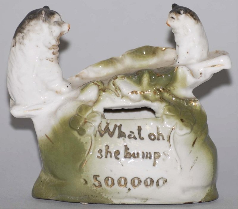 Pottery Two Bears on Seesaw Still Bank.: Condition (Excellent). Size 3 - 1/4" T. 3 - 1/4" T.