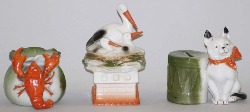 Lot of 3: Pottery Animal Still Banks.: Includes a lobster, heron on nest, and cat by drum. Condition (Excellent Plus - Near Mint). Size Largest: 4 - 1/2" T. Largest: 4 - 1/2" T.