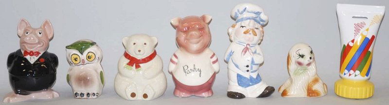 Lot of 7: Pottery Still Banks.: Condition (Near Mint). Size Largest: 8 - 1/2" T. Largest: 8 - 1/2" T.