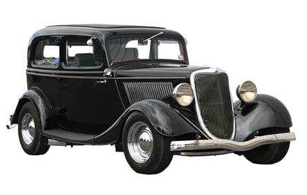 1934 FORD TUDOR BLACK TWO DOOR SEDAN.