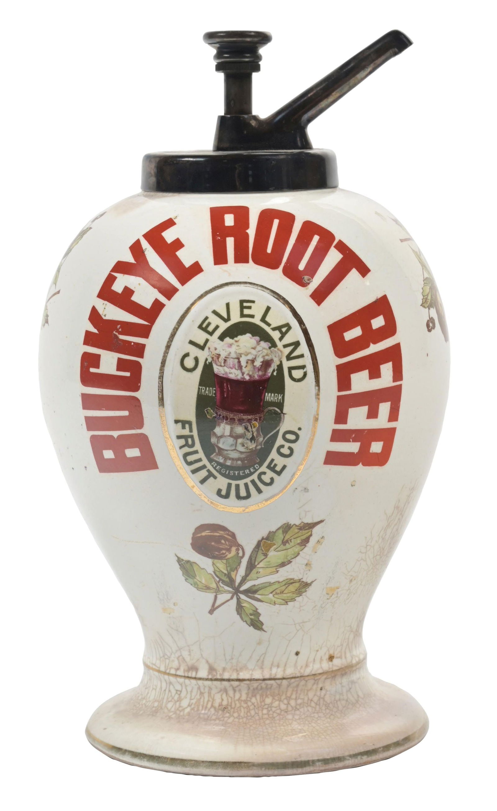 BUCKEYE ROOT BEER SYRUP DISPENSER: A fair example of a Buckeye Root Beer dispenser from the Cleveland Fruit Juice Company. CONDITION: There is a hairline crack and chip, emanating from underneath the push pump. There is significant sta