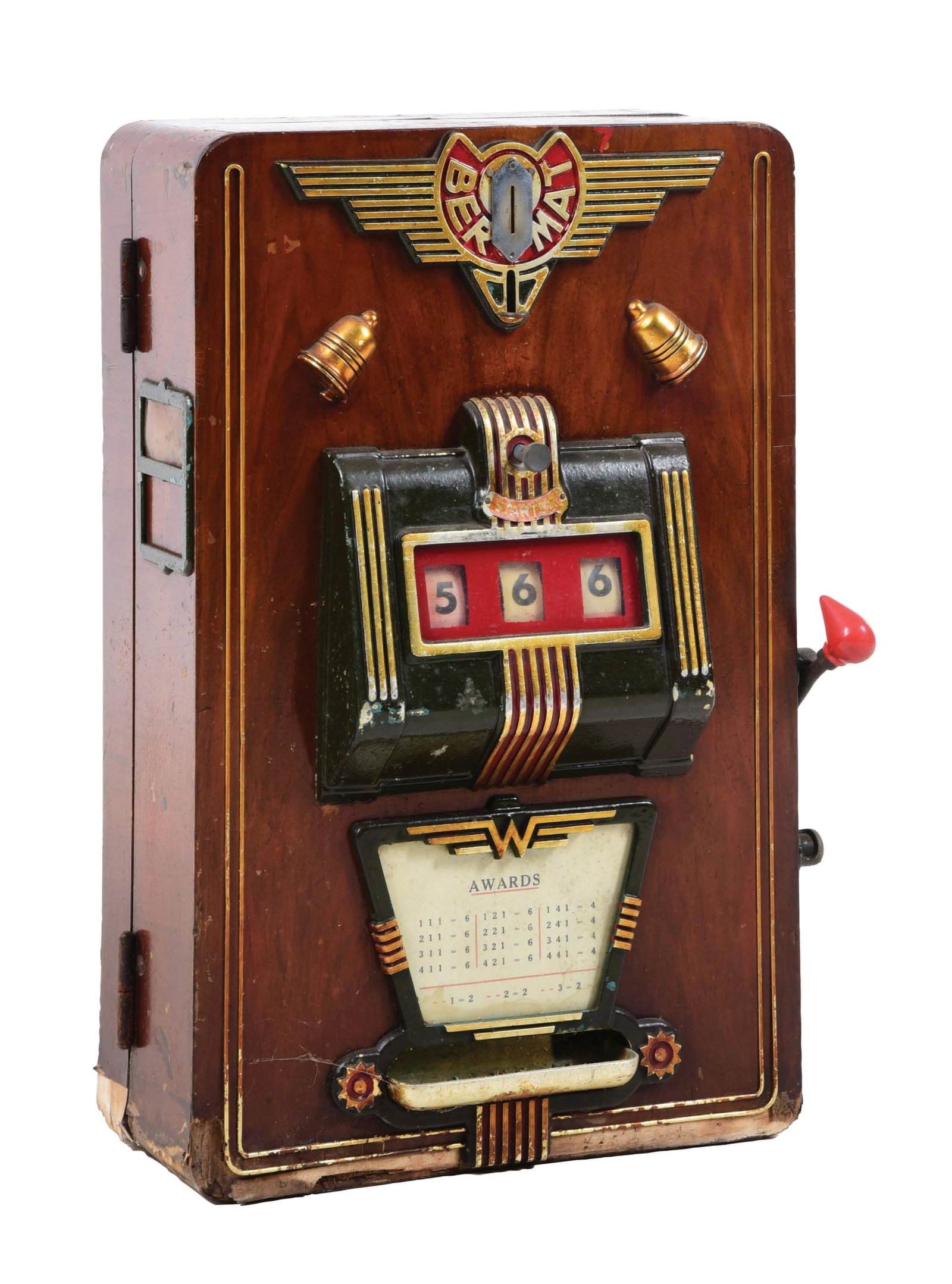 ENGLISH BEROMAT SLOT MACHINE: An English slot machine, called Beromat, which operates on a English penny. CONDITION: It shows the original wood case with the original hardware, reel strips and award card. There are areas of finish
