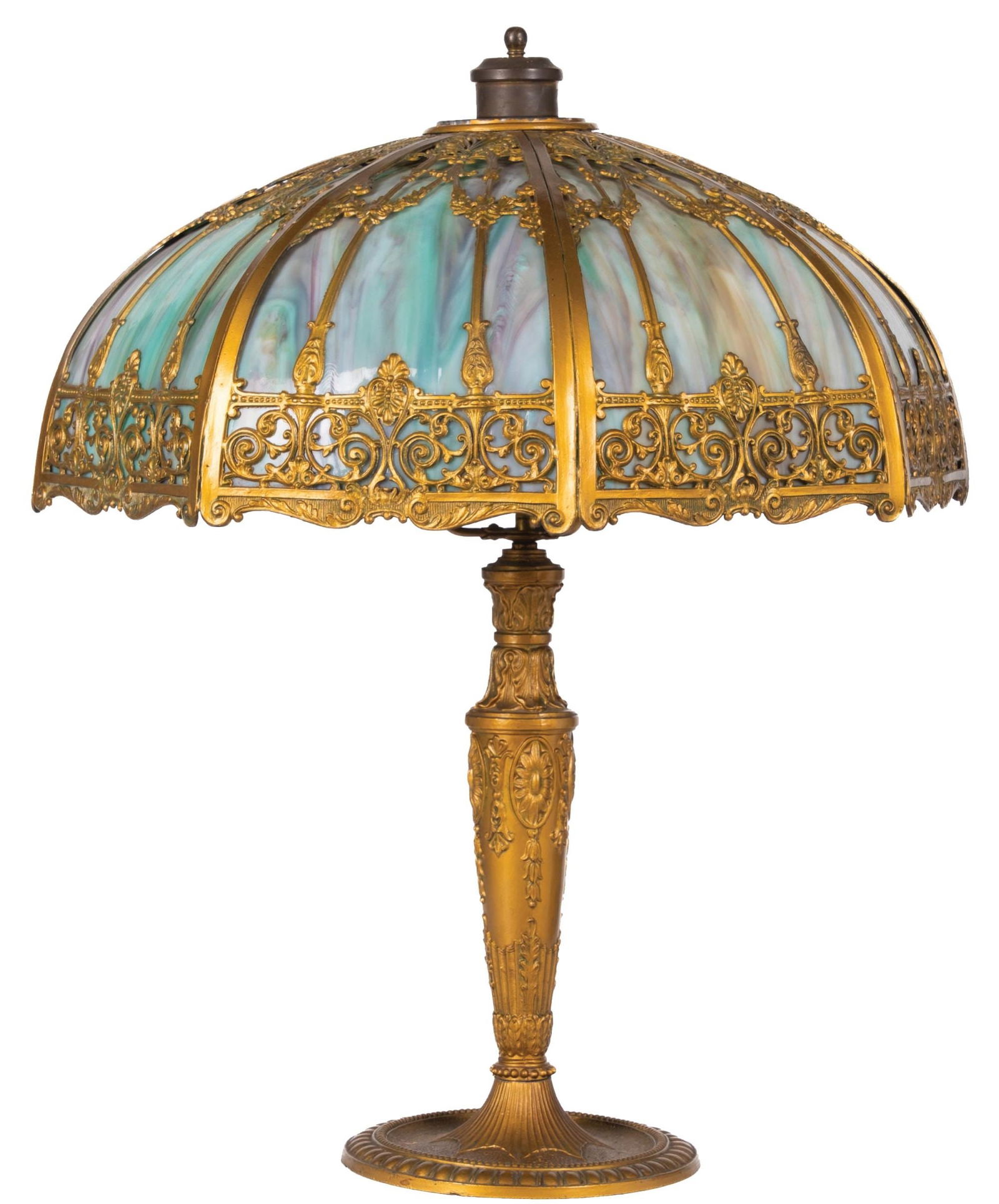 STAINED GLASS LAMP: Stained glass lamp with brass base. CONDITION: Lamp is excellent condition with no visible cracks or breaks to the shade. The base shows minor areas of tarnish and very minor staining. Lamp is complet