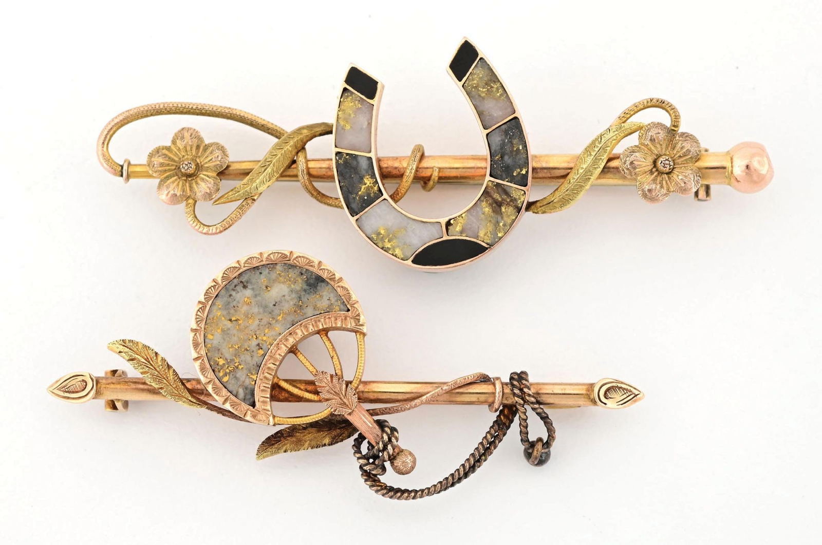 COLLECTION OF 2 GOLD QUARTZ HORSESHOE AND FEATHER PINS (1 of 2)