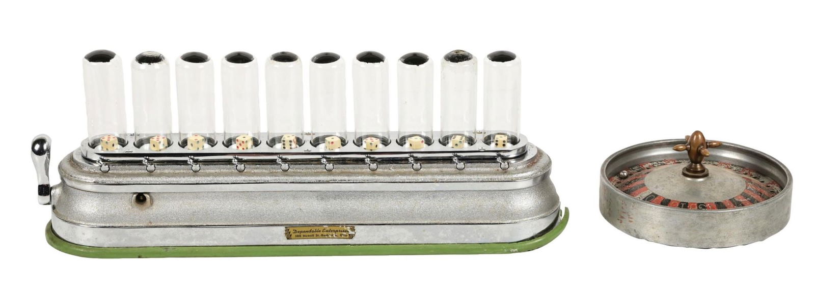 LOT OF 2: DEPENDABLE ENTERPRISES 10-COLUMN DICE POPPER & ROULETTE WHEEL: C: 1910. A pair of early gambling pieces. !. Dependable Enterprises dice popper. Cast iron base with glass tubes, dice pop together or player can choose which ones stay and pop the rest. CONDITION: We