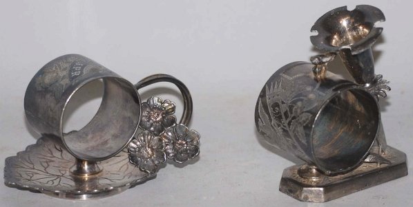 Lot of 2: Figural Napkin Rings.: Includes Simpson #024 and Toronto #1145. Condition (Excellent). Size Largest: 3 - 1/2" T.