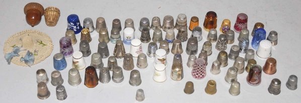 Large Lot of 50+ Thimbles.: Includes china, glass, and metal. Many unusual pieces. Condition (Excellent). Size Largest: 1 - 3/4" T.