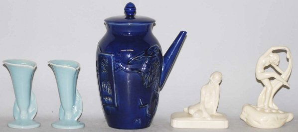 Lot of 5: Assorted Pieces.: Includes one Cowan scarf dancer flower frog, one Rookwood nude white paperweight, one pair of Rookwood bud vases, and one blue side pour pitchers with chips to inner lid and repair to spout. Condition