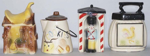 Lot of 4: American Bisque Cookie Jars.: Includes Sad Iron, Toy Soldier, Coffee Pot, and Saddle. Toy soldier has minor paint loss and a small interior hairline. Condition (Excellent). Size Largest: 11 - 1/2" T.