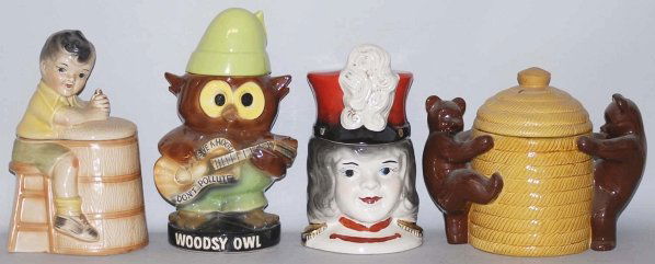 Lot of 4: Assorted Cookie Jars.: Includes a Brayton Laguna bears on Beehive, a Regal China Majorette, a McCoy Woodsy Owl and an unidentified boy with butter churn. The majorette has very minor paint loss. Condition (Excellent). Size