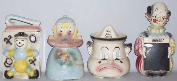 Lot of 4: American Bisque Cookie Jars.: Includes a blackboard clown, candy cane babies, clown and a girl in a blue dress. Minor crazing here and there. Moderate paint loss to blackboard clown. Condition (Very Good). Size Largest: 13 - 1/2"