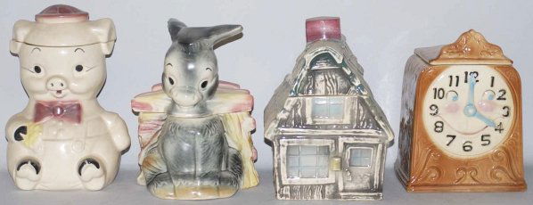 Lot of 4: Brush Cookie Jars.: Includes a Cookie House, an old clock, a donkey with cart and a sitting piggy. Minor crazing here and there. Condition (Very Good - Excellent). Size Largest: 10 - 1/2" T.