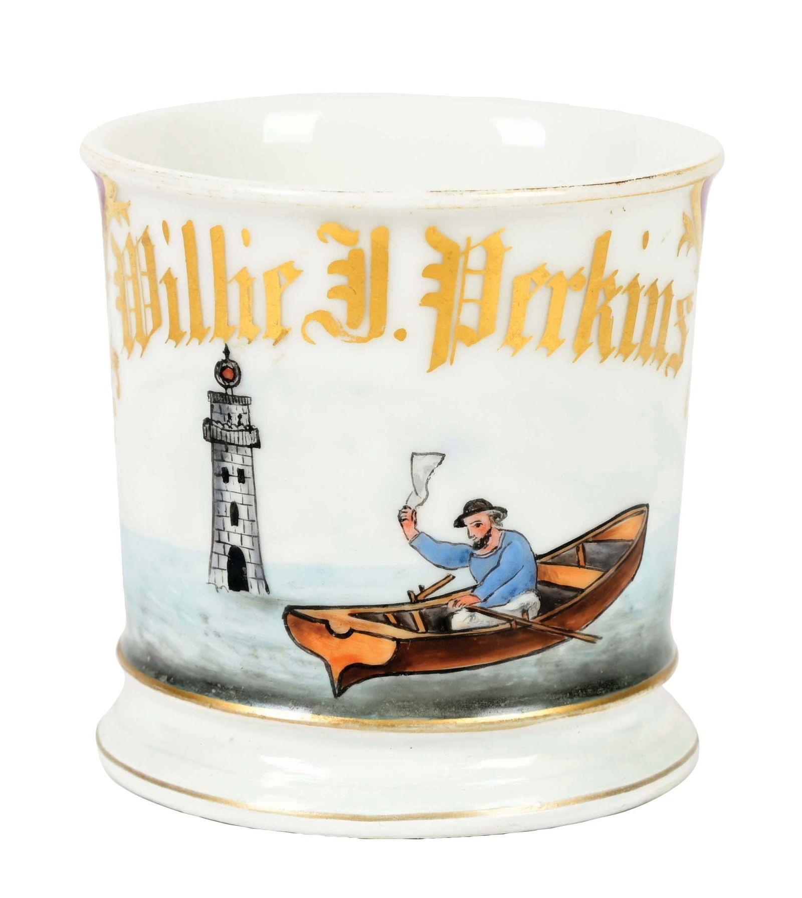 MAN IN BOAT LIGHTHOUSE SHAVING MUG: Wonderful image of man in boat with lighthouse in background. Has name Willie J. Perkins in gold gilt. Purple wrap. Condition: (Near Mint). Dimensions: 3 - 1/2"t x 3 - 1/2"d