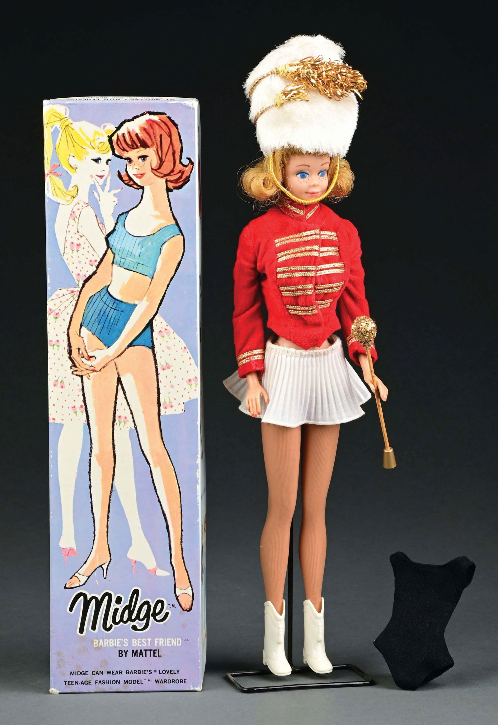 1960S BARBIE, MIDGE BARBIE'S BEST FRIEND DOLL IN BOX: Barbie’s best friend Midge in her original box. Condition: (Excellent) Dimensions: box, 12" x 3" x 1 - 3/4"