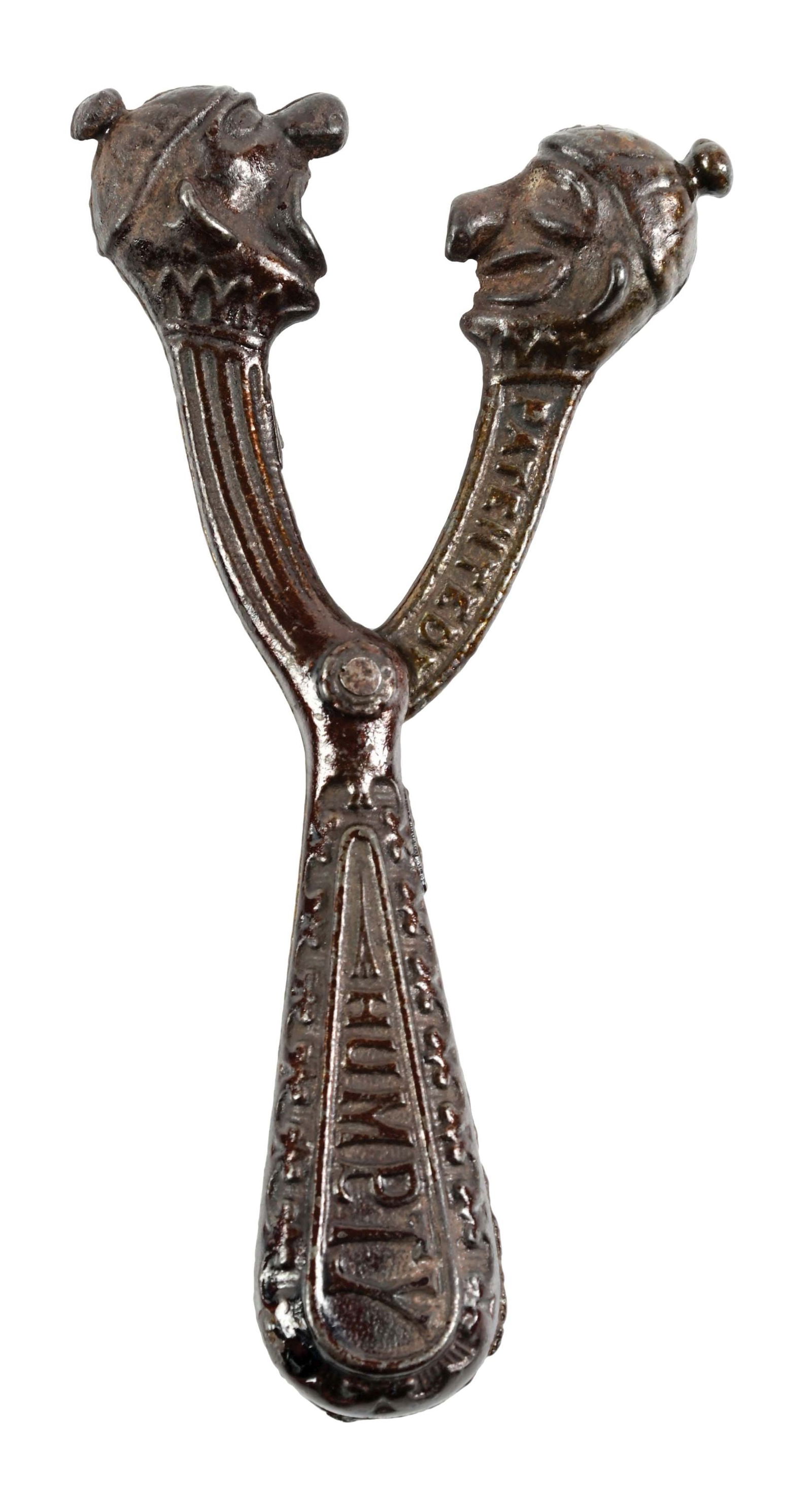 SCARCE VINTAGE ORIGINAL CAST IRON HUMPTY DUMPTY CLOWN CAP GUN: Late 19th century. When squeezed together, the cap is placed in one mouth and hammered by the other. It is embossed "Humpty" on one side and "Dumpty" on the other. Condition: (Very Good - Excellent) D