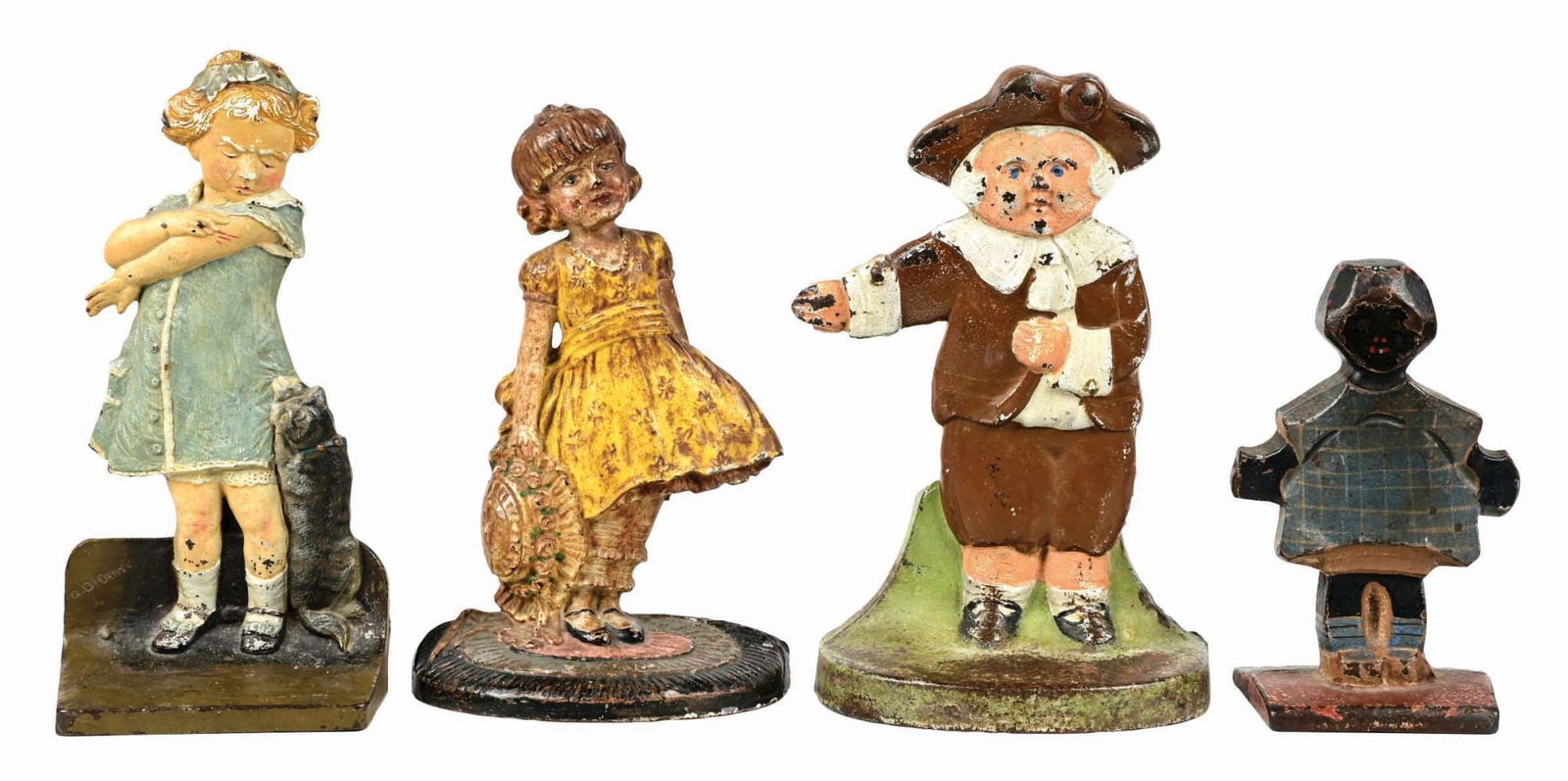 LOT OF 4: FIGURAL CAST IRON DOORSTOPS: Nice grouping of 4 figural doorstops. Condition: (Excellent) Dimensions: Largest: 5 - 1/2" x 3" x 8 - 1/2".
