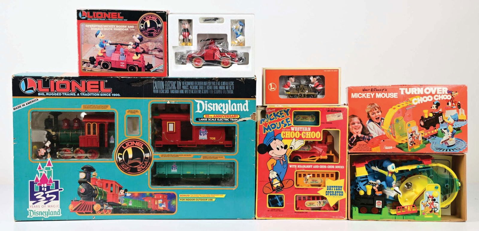 LOT OF 5: MORE CONTEMPORAY LIONEL & OTHER WALT DISNEY CHARACTER TRAIN & HAND CARS IN ORIGINAL BOXES (1 of 2)