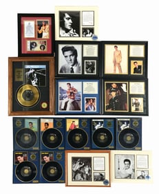 LOT OF APPROXIMATELY 15 VARIOUS RE-RELEASED ELVIS PRESLEY MEMORABILIA RECORDS IN PLASTIC CASES &