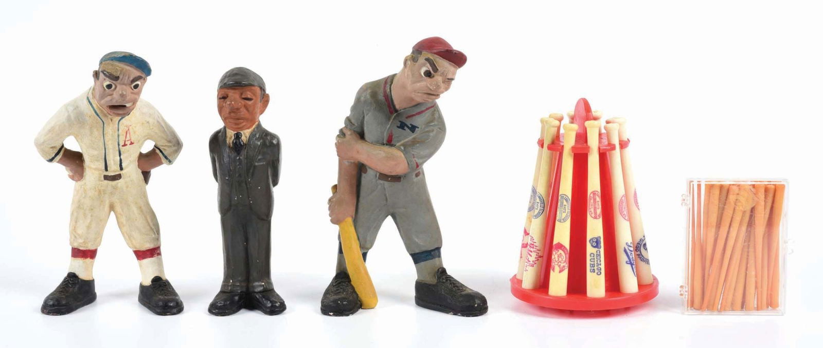 LOT OF 5: VARIOUS BASEBALL MEMORABILIA ITEMS: There are three 1940s Rittgers chalkware baseball figures: a pitcher, a batter, an umpire. There is a small plastic bank with bats for major league teams, made in the USA 1960s. There are approximatel